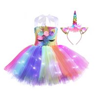 This unicorn light up dress will be the best dress you will find for your special little girl.  It is unique & eye catching with stunning details, the tutu has lots of layers & volume to it. All their friends will want one. The dress comes with a matching LED light up Unicorn horn.  The wings are 3D, padded, & removable.  Lights can be switched on or off  Dress and Horn light up  Contact Us  Email: info@lucymelon.com